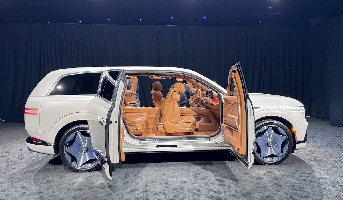 The Genesis GV90 has a clever trick: A pop-up 24.6″ theater [Video]