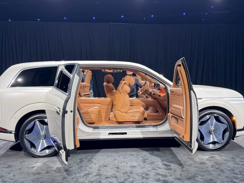 The Genesis GV90 has a clever trick: A pop-up 24.6″ theater [Video]