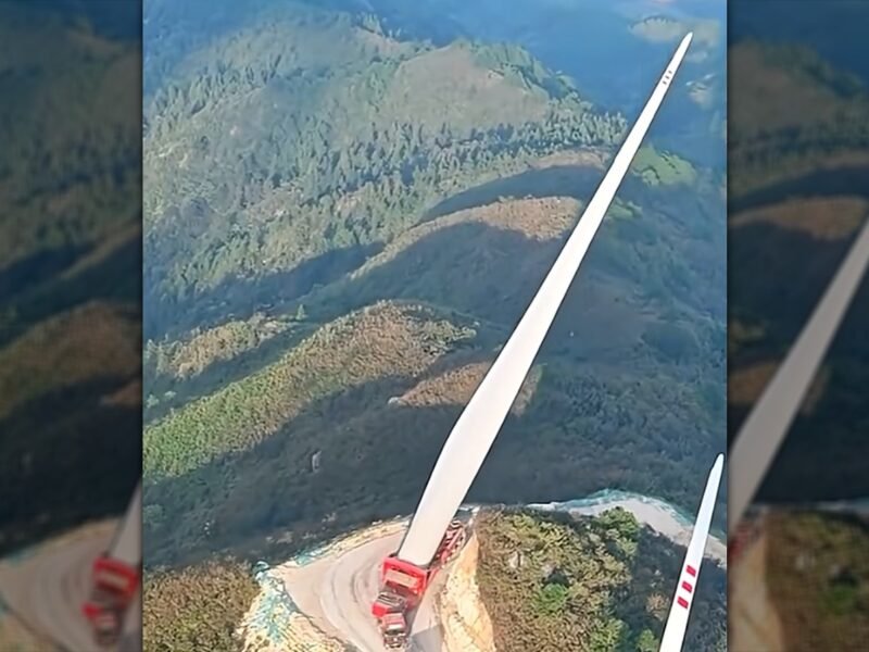 Truck Carrying 387-Foot Long Wind Turbine Blade Up A Mountain Looks Like The Most Stressful Work Day Ever